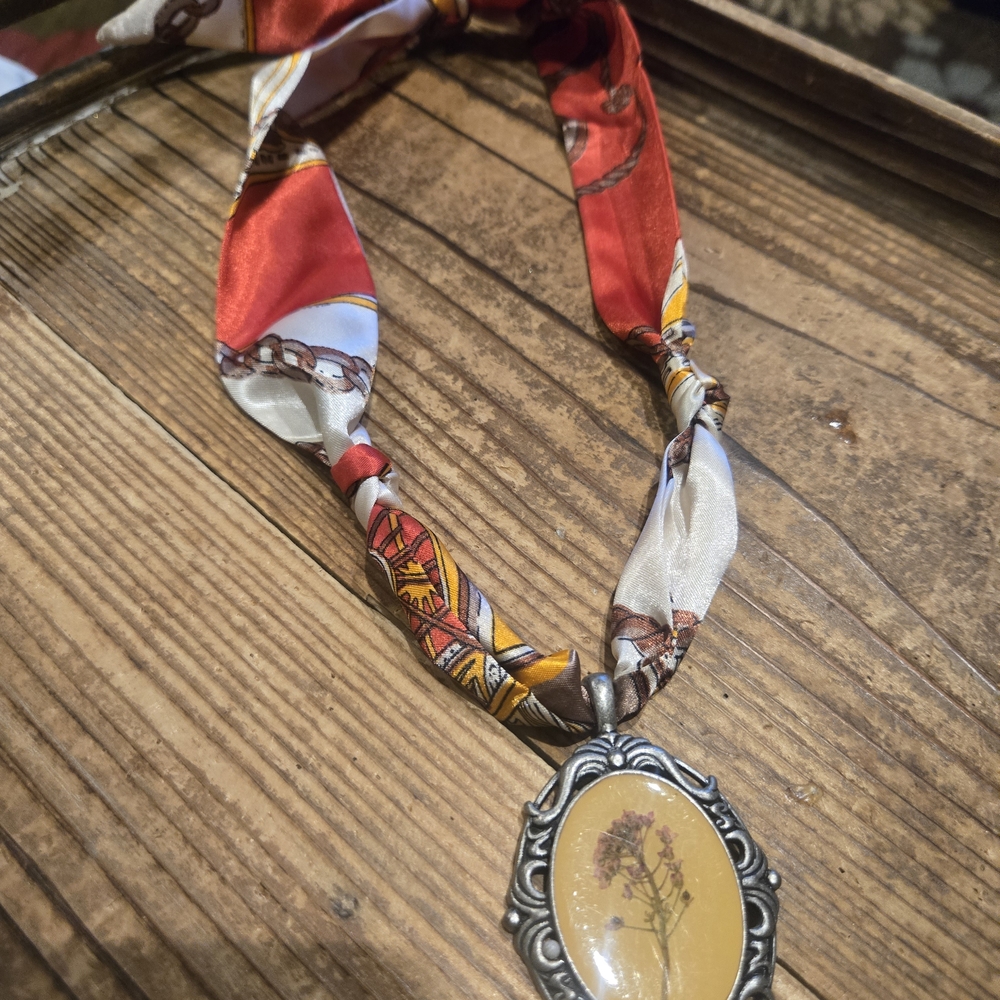 Floral Pendant Necklace with Red and Silver Accents